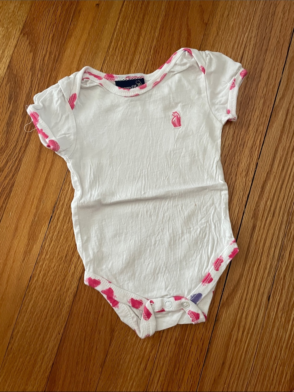 Baby One-Piece Bodysuit in White with Pink Accents